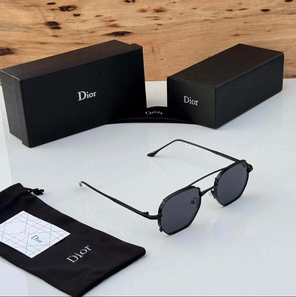 Dior sunglasses with black case and pouch on a white surface with wooden background