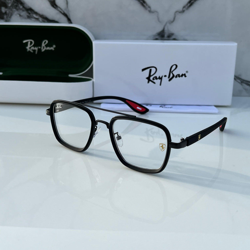 Black Ray-Ban eyeglasses on a white surface with a marble-patterned background