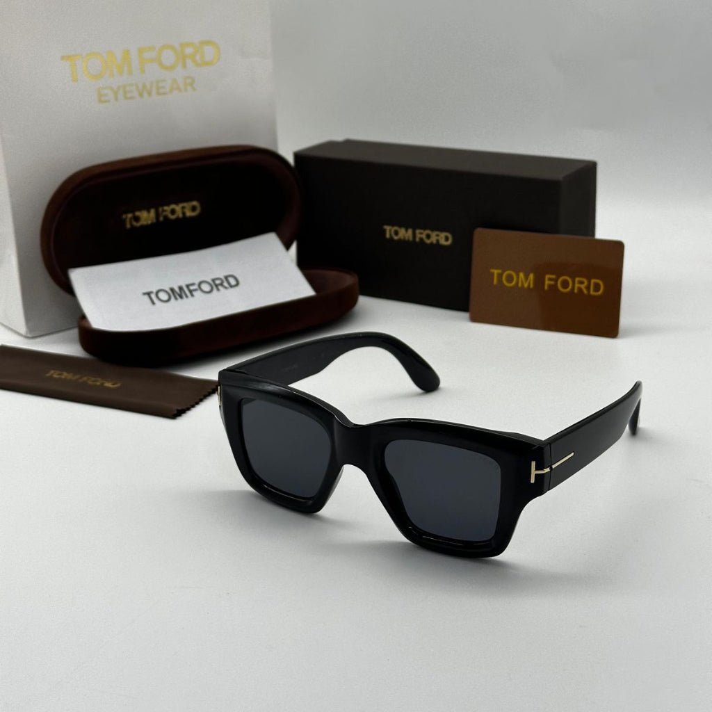 Tom Ford sunglasses with packaging on a white background