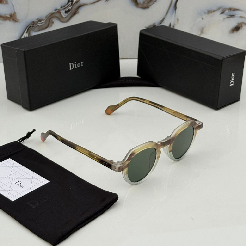 Dior sunglasses with packaging on a marble surface